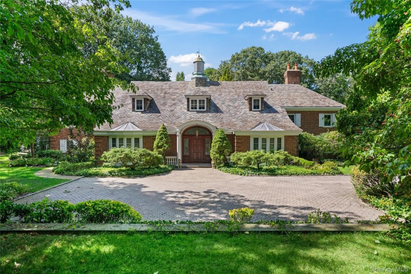 ROSLYN HARBOR; Timeless Brick Manor: Behind iron gates and a - Beach Home for sale in Roslyn Harbor, New York on Beachhouse.com