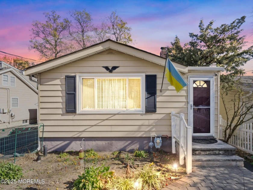 Just blocks from the sandy shores of Cliffwood Beach, this - Beach Home for sale in Keyport, New Jersey on Beachhouse.com