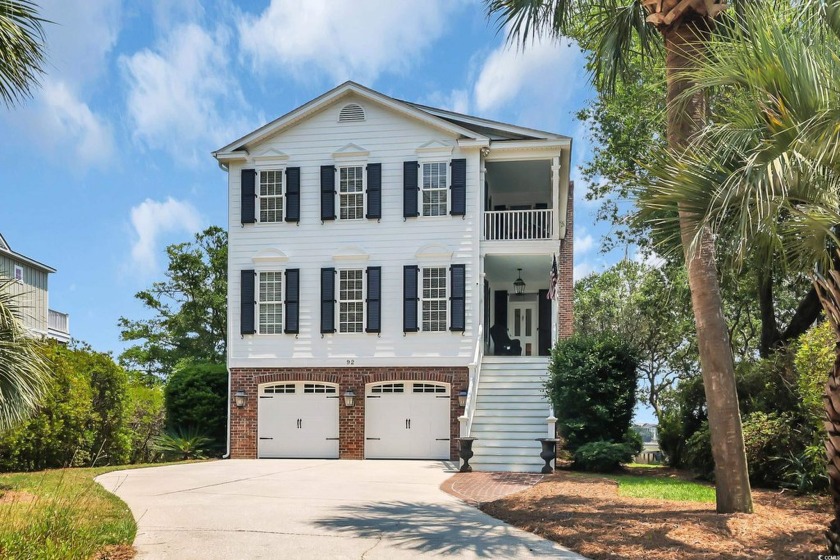 Welcome to your creekfront retreat in Pawleys Island! Perfectly - Beach Home for sale in Pawleys Island, South Carolina on Beachhouse.com