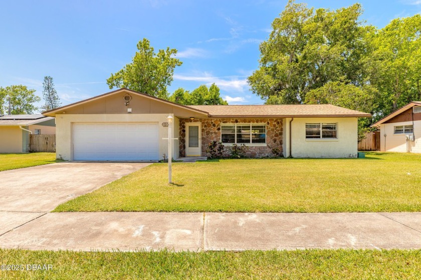 Welcome to this charming three-bedroom, two-bathroom home - Beach Home for sale in South Daytona, Florida on Beachhouse.com