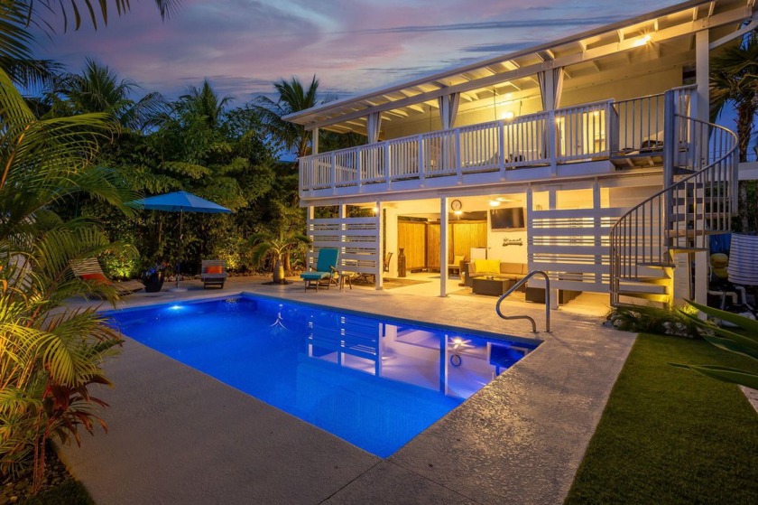 Nestled on a quiet street in the heart of Plantation Key, this - Beach Home for sale in Plantation Key, Florida on Beachhouse.com