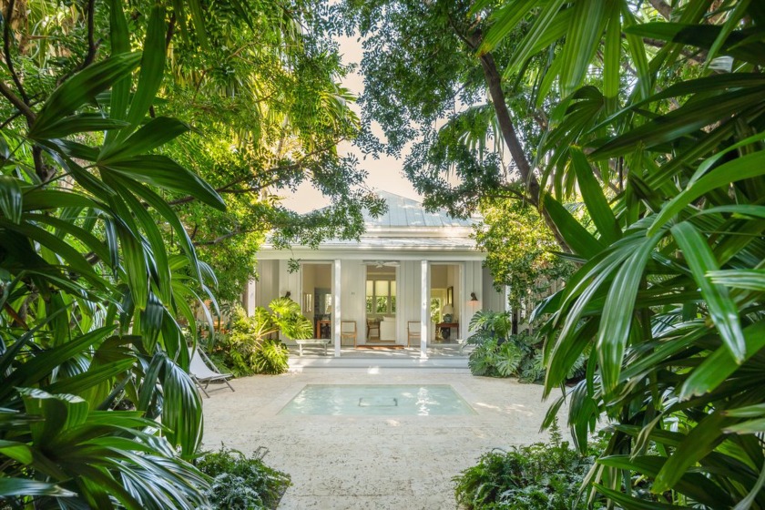 Step into a hidden indoor-outdoor sanctuary with the charm of a - Beach Home for sale in Key West, Florida on Beachhouse.com