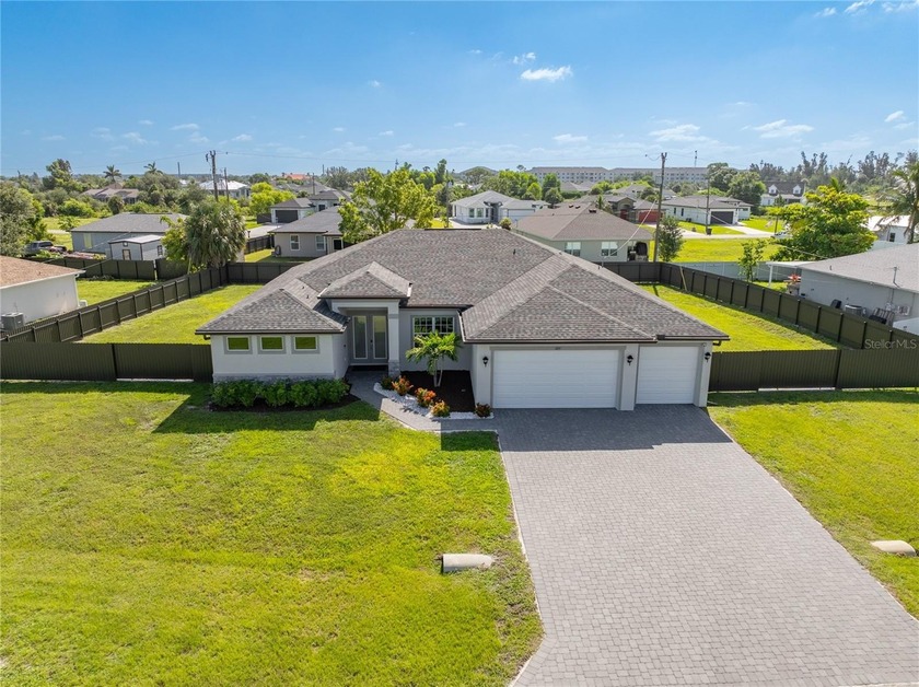 This is a beautifully designed 4 bedroom, 3 bathroom home on a - Beach Home for sale in Cape Coral, Florida on Beachhouse.com