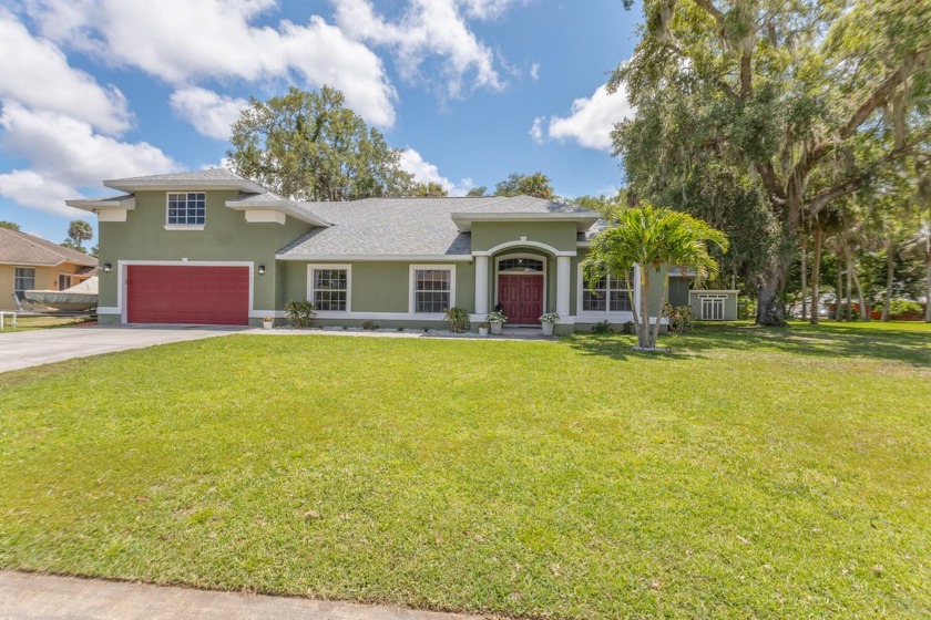 FIVE bedroom PLUS 2 flex rooms to fit all of your families - Beach Home for sale in Palm Bay, Florida on Beachhouse.com