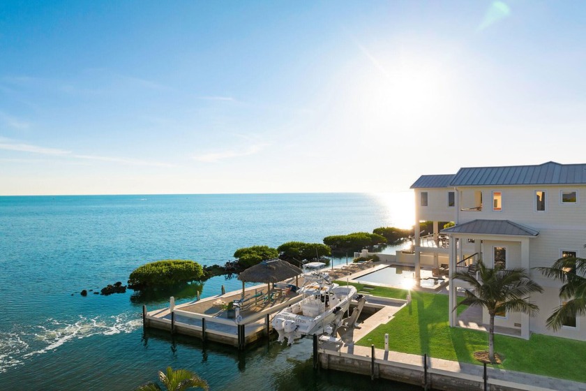 Modern luxury meets barefoot elegance in this oceanfront - Beach Home for sale in Plantation Key, Florida on Beachhouse.com