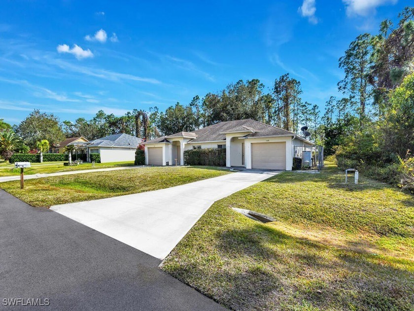 A Great opportunity! This duplex has a wooded backyard and oak - Beach Home for sale in Lehigh Acres, Florida on Beachhouse.com