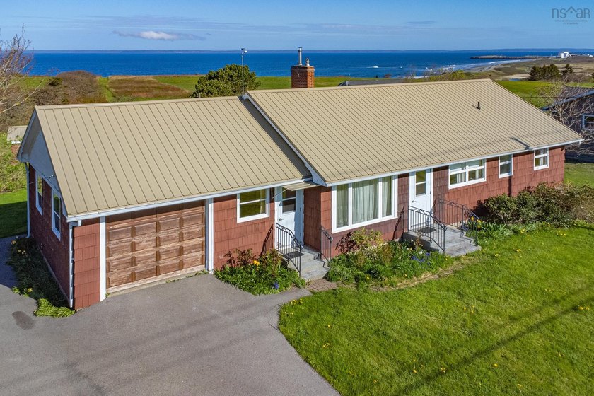 Introducing 9735 Highway 1, Lower Saulnierville. Perched along - Beach Home for sale in Lower Saulnierville, Nova Scotia on Beachhouse.com