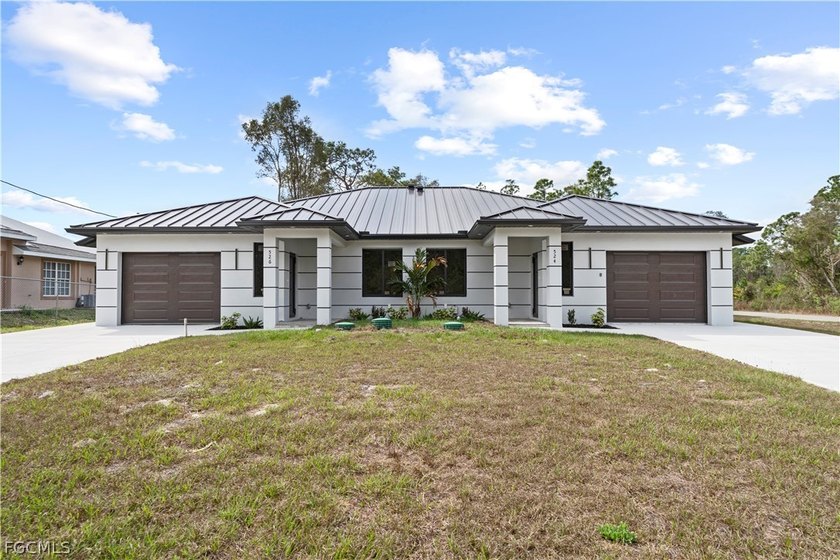 This brand-new construction duplex in the growing community of - Beach Home for sale in Lehigh Acres, Florida on Beachhouse.com