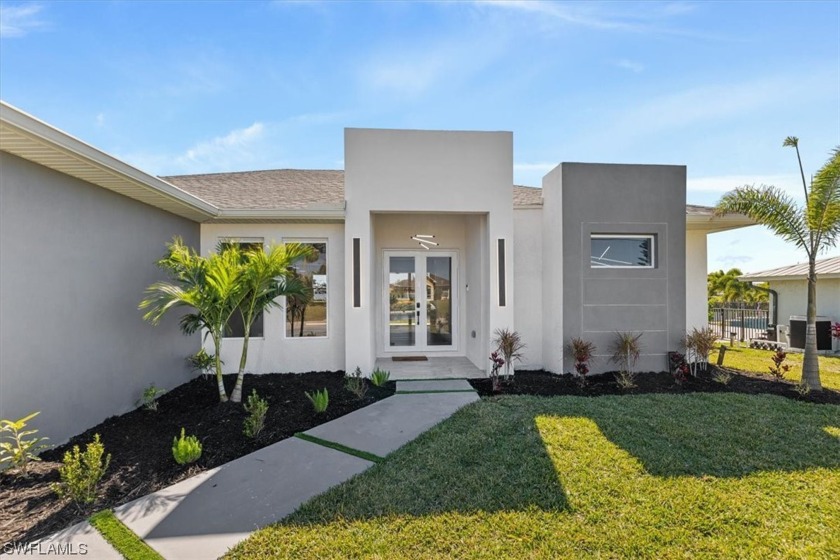 This BEAUTIFUL Luxury New Construction Waterfront Home has so - Beach Home for sale in Cape Coral, Florida on Beachhouse.com