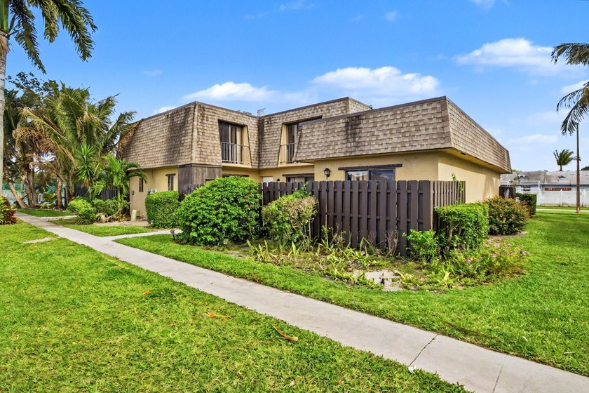 Welcome to this beautifully updated townhome with serene lake - Beach Townhome/Townhouse for sale in Palm Springs, Florida on Beachhouse.com