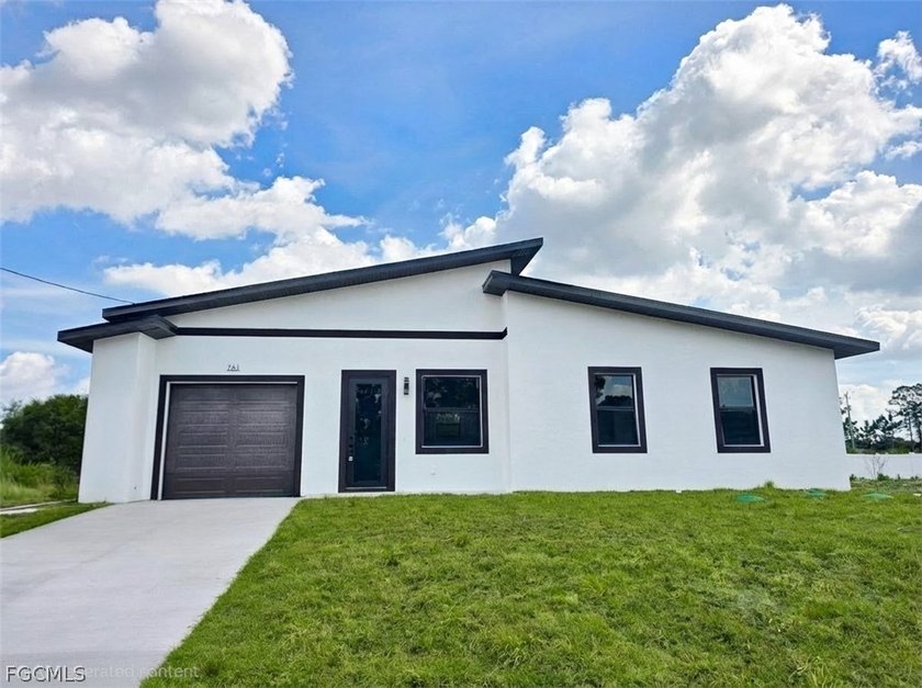 Brand-new construction on Roma Avenue South. This house fetures - Beach Home for sale in Lehigh Acres, Florida on Beachhouse.com