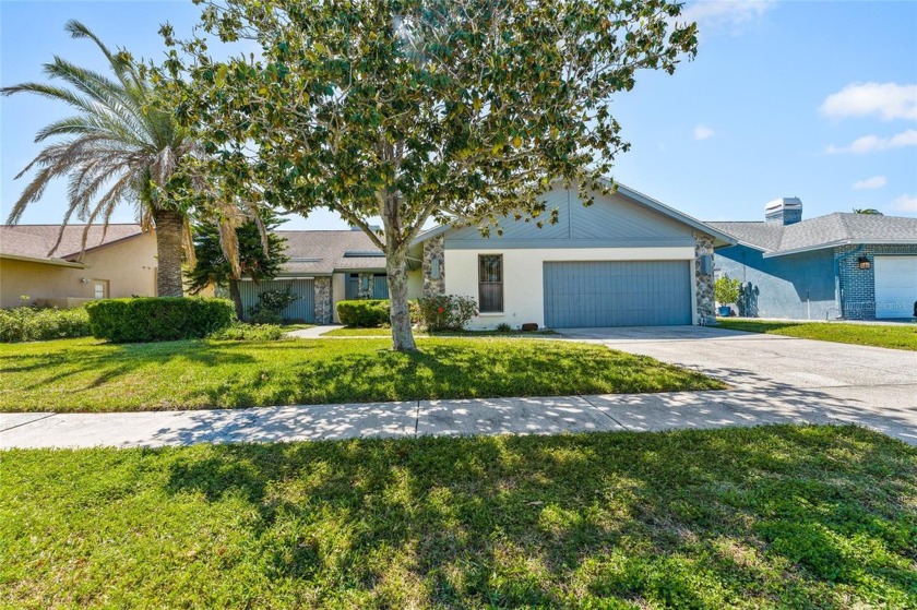Here is a remarkable opportunity to own a waterfront home with - Beach Home for sale in Tampa, Florida on Beachhouse.com