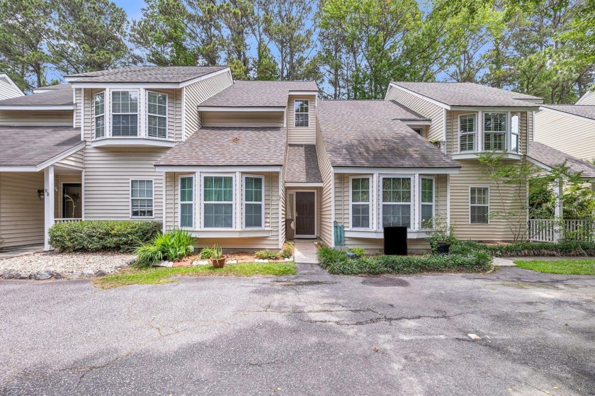 Welcome home to this inviting 3-bedroom, 2-bath, two-story - Beach Home for sale in Charleston, South Carolina on Beachhouse.com