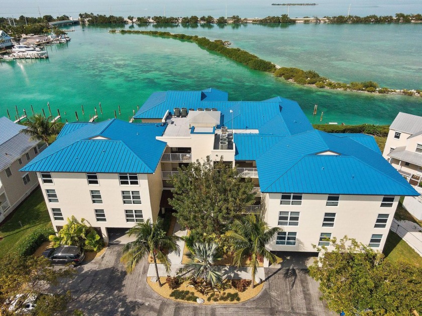 Discover an exceptional opportunity to own a three-bedroom - Beach Condo for sale in Duck Key, Florida on Beachhouse.com