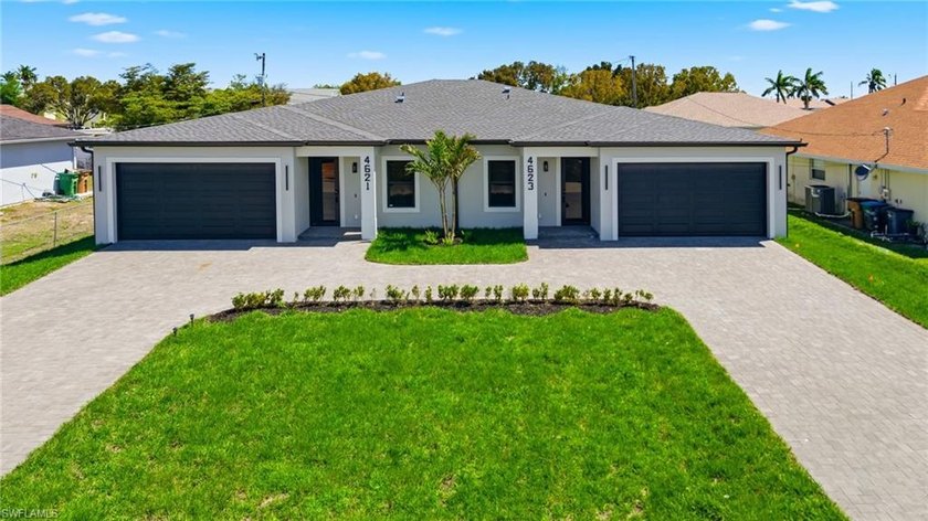 This is not your average duplex, this is luxury living on both - Beach Home for sale in Cape Coral, Florida on Beachhouse.com