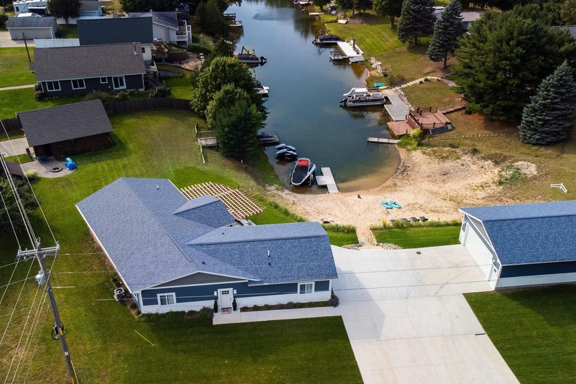 Have you been looking for the perfect lakefront retreat? This 5 - Beach Home for sale in Mears, Michigan on Beachhouse.com