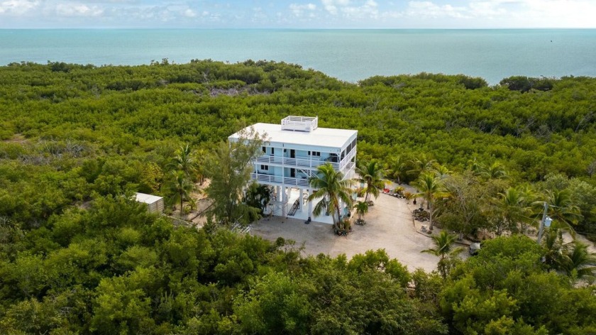 Come explore 17270 Old State Road 4A, a rare gem nestled on - Beach Home for sale in Sugarloaf Key, Florida on Beachhouse.com