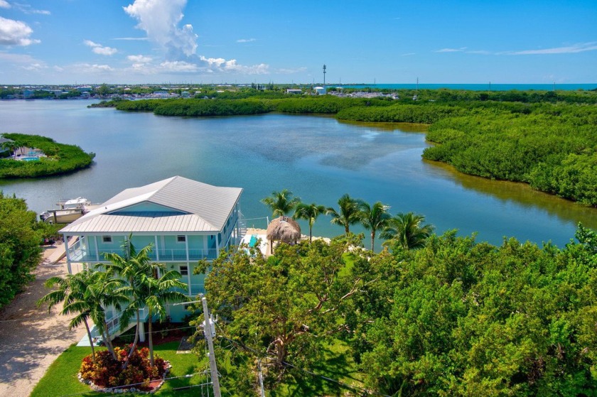 Endless Sunset Views over an extra-wide deep draft lagoon, with - Beach Home for sale in Marathon, Florida on Beachhouse.com