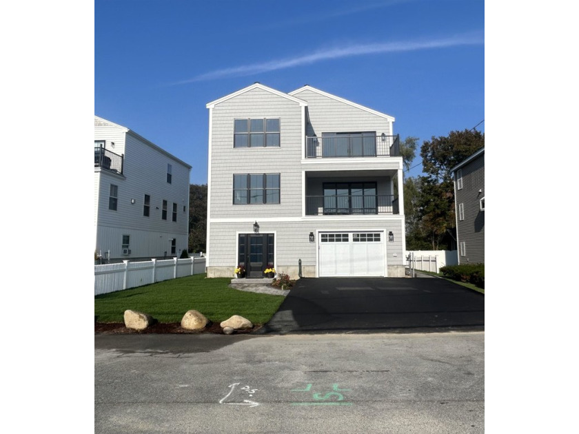 This luxurious coastal retreat offers a perfect blend of modern - Beach Home for sale in Hampton, New Hampshire on Beachhouse.com