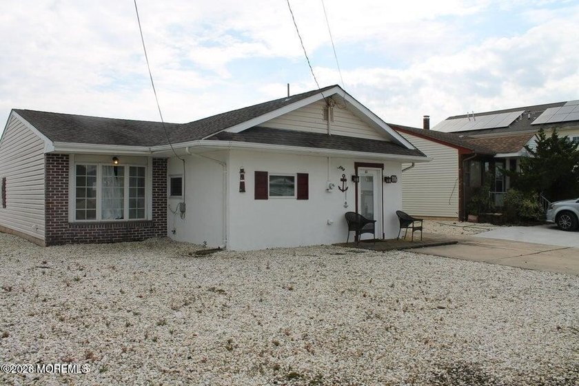 boater's dream this quaint expanded three-bedroom ranch nested - Beach Home for sale in Little Egg Harbor, New Jersey on Beachhouse.com