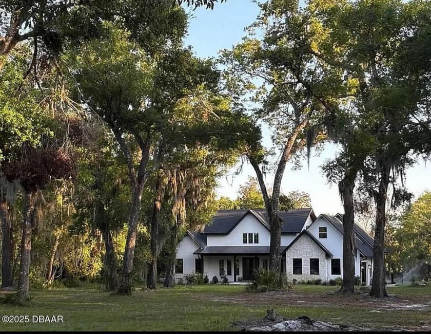 Welcome to your private paradise! This stunning 4-bedroom - Beach Home for sale in Port Orange, Florida on Beachhouse.com