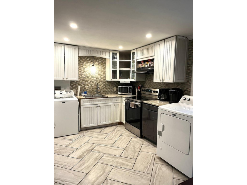 Discover the potential of this delightful 3-bedroom, 1-bathroom - Beach Home for sale in Shirley, New York on Beachhouse.com