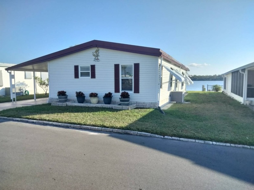 Remodeled LAKE FRONT HOME, bring your boat and fishing poles!! - Beach Condo for sale in Holiday, Florida on Beachhouse.com