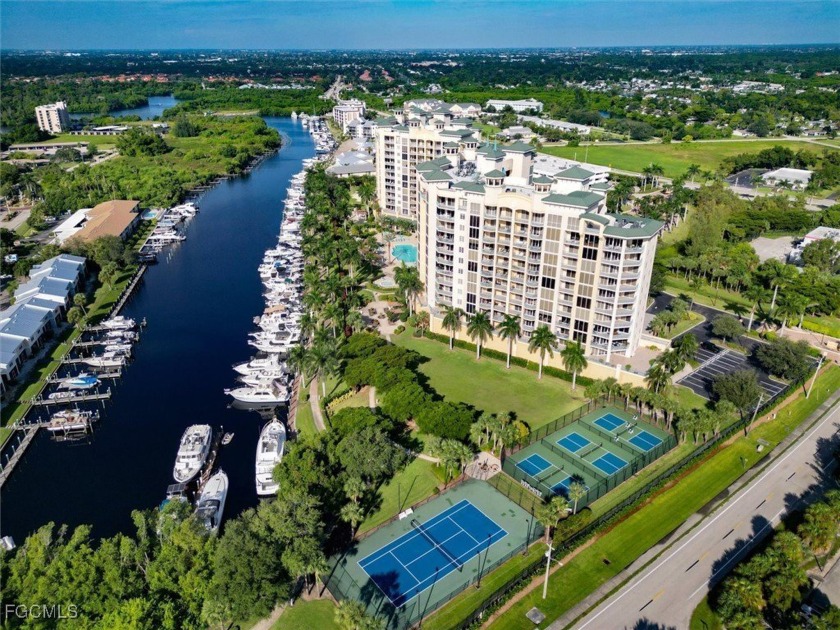 Breathtaking Riverfront Living - Sunrise Views from the 12th - Beach Condo for sale in North Fort Myers, Florida on Beachhouse.com