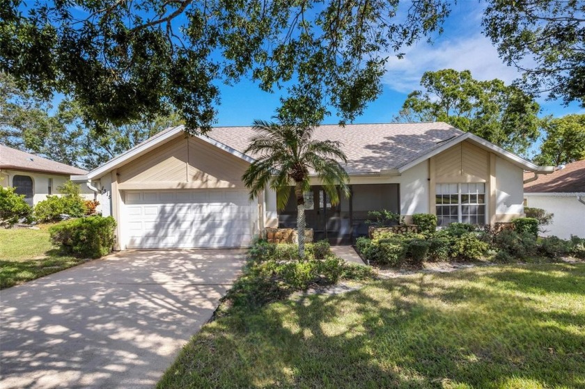 If you like open  airy spaces and gorgeous golf views, be sure - Beach Home for sale in Palm Harbor, Florida on Beachhouse.com