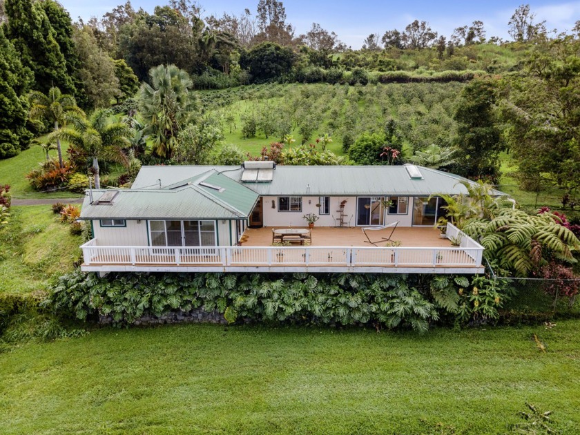 High on the slopes of the KONA COAST overlooking the Blue - Beach Home for sale in Captain Cook, Hawaii on Beachhouse.com