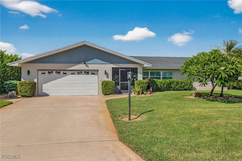 Beautiful 2 Bedroom, 2 Bathroom Pool Home with 2-Car Garage - - Beach Home for sale in Lehigh Acres, Florida on Beachhouse.com
