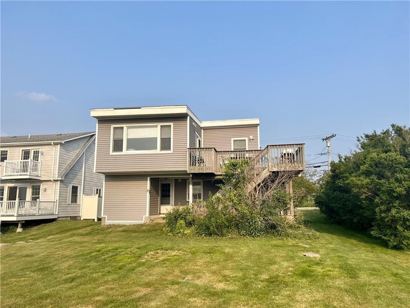 Welcome to your coastal oasis-this expanded two-story cottage - Beach Home for sale in Narragansett, Rhode Island on Beachhouse.com