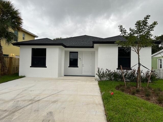 This single-family gem boasts 5 bedrooms, 2 baths, and a host of - Beach Home for sale in West Palm Beach, Florida on Beachhouse.com