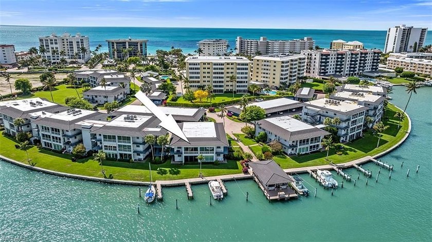 Enjoy postcard-worthy bay views from this second floor - Beach Condo for sale in Naples, Florida on Beachhouse.com