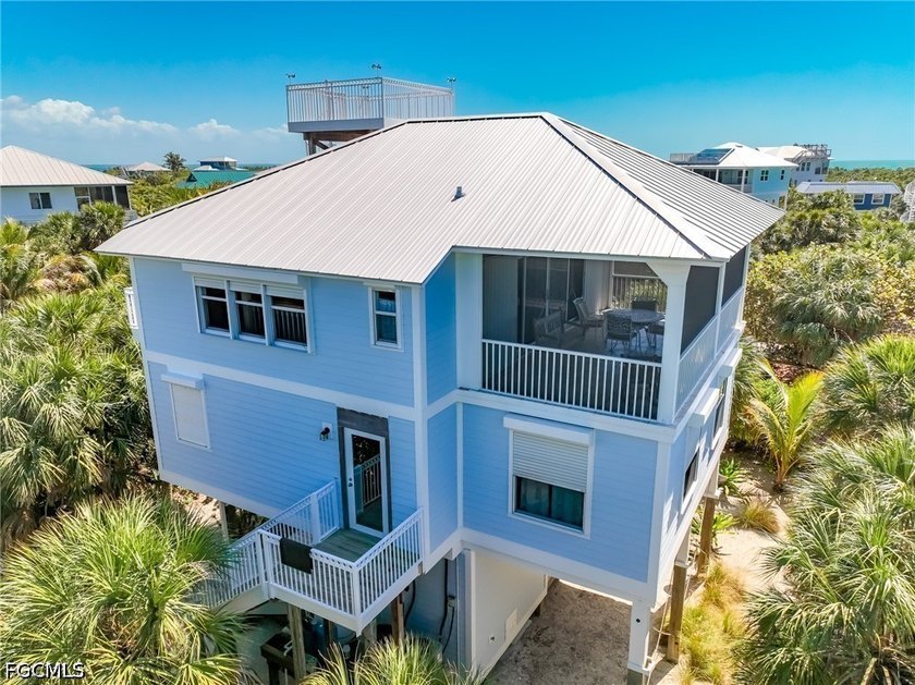 Elevated Living, Gulf Views & Rooftop Sunsets Imagine pulling up - Beach Home for sale in North Captiva Island, Florida on Beachhouse.com