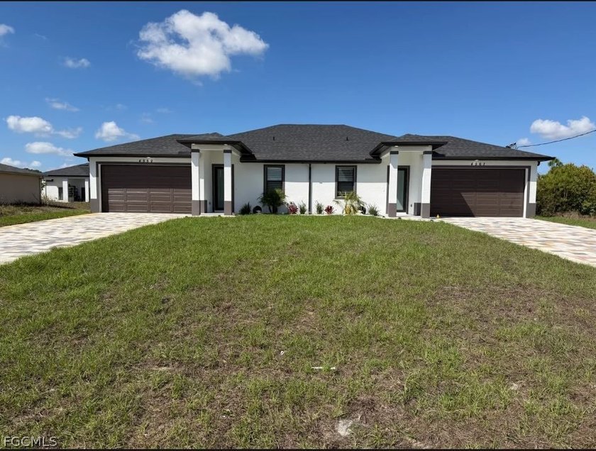 This brand-new duplex is a perfect mix of style, space, and - Beach Home for sale in Lehigh Acres, Florida on Beachhouse.com