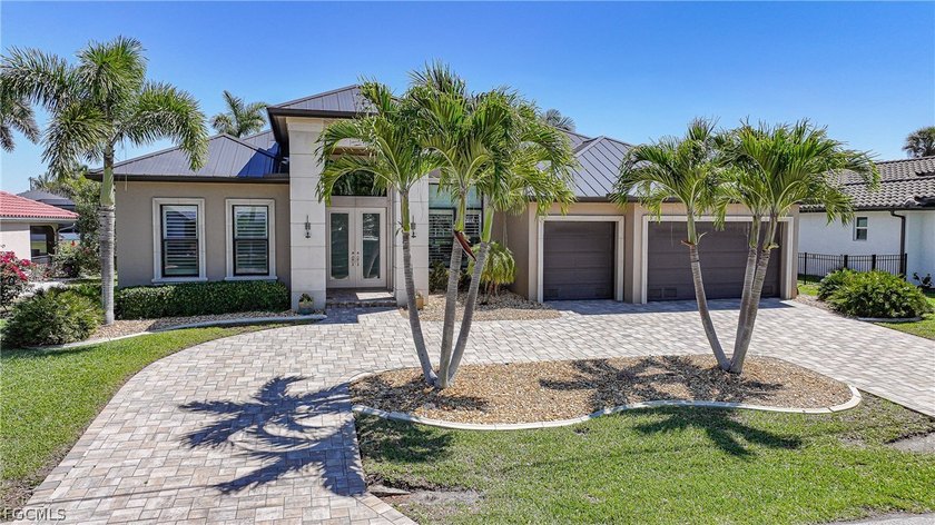 Welcome to an exceptional waterfront retreat in the highly - Beach Home for sale in Punta Gorda, Florida on Beachhouse.com