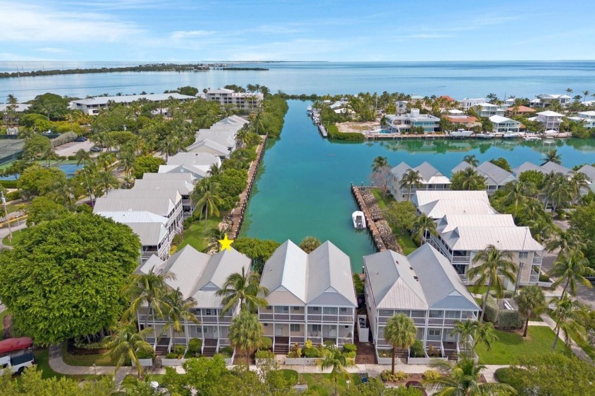 Discover the chance to own one of the few 4-bedroom villas at - Beach Home for sale in Duck Key, Florida on Beachhouse.com