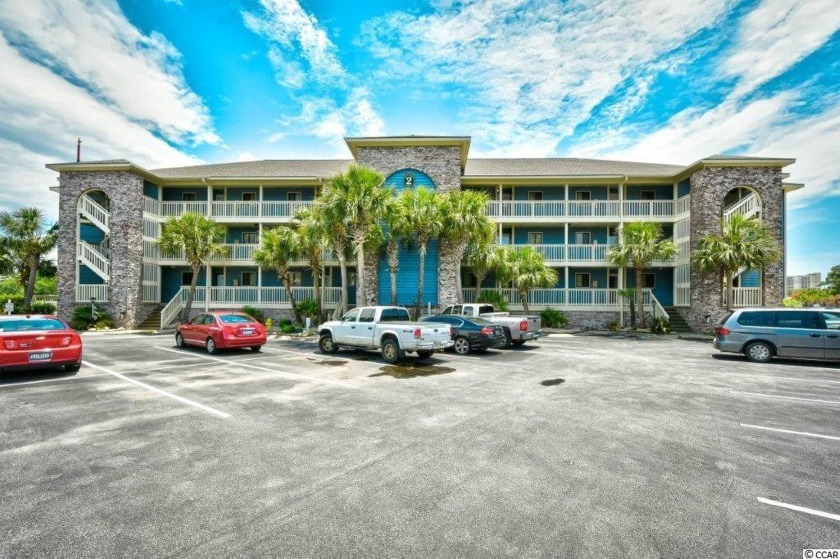 Situated in the secluded gated community of Marsh Oaks, this - Beach Condo for sale in North Myrtle Beach, South Carolina on Beachhouse.com