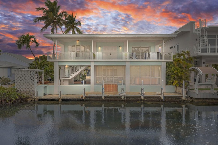 This 4-bedroom, 4-bathroom concrete home with impact windows & - Beach Home for sale in Long Key, Florida on Beachhouse.com