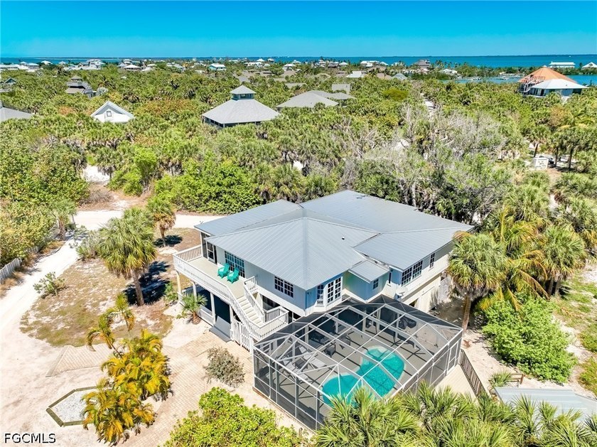Rare 6-bedroom North Captiva Island Home with Screened Pool Area - Beach Home for sale in North Captiva Island, Florida on Beachhouse.com