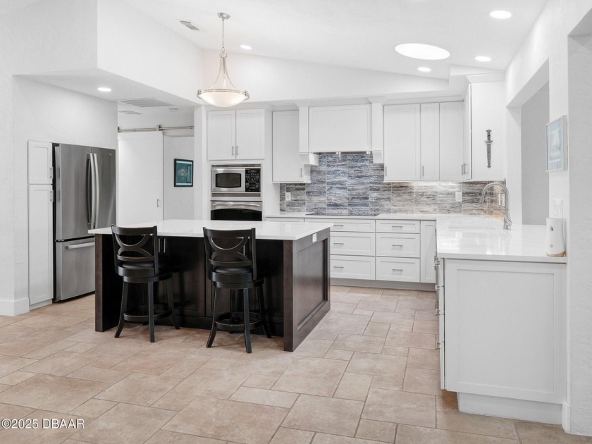 Directly on the Intracoastal, this 3 bdrm, 3 bath brick POOL - Beach Home for sale in Edgewater, Florida on Beachhouse.com