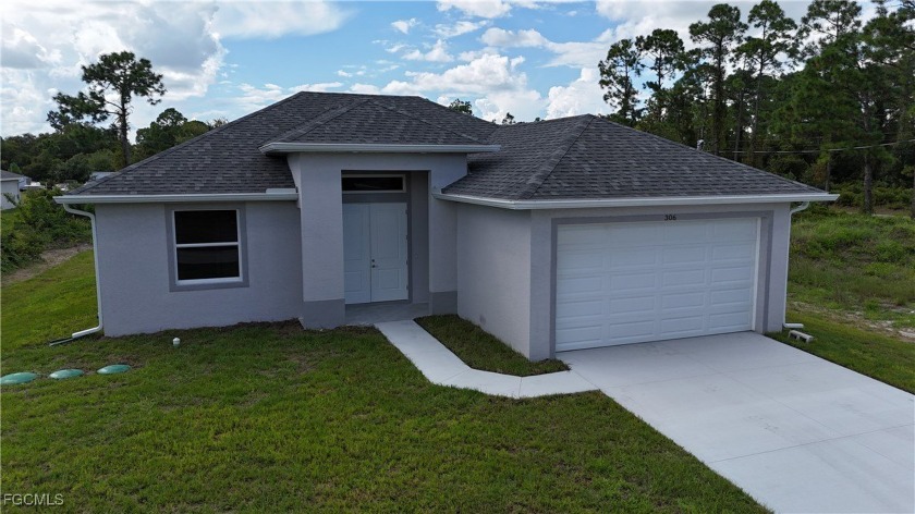 Stunning new construction - move-in ready 3-bedroom, 2-bath home - Beach Home for sale in Lehigh Acres, Florida on Beachhouse.com