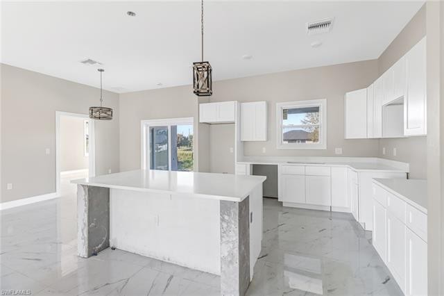 Welcome to this exquisite new construction residence nestled in - Beach Home for sale in Lehigh Acres, Florida on Beachhouse.com