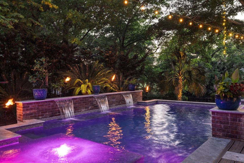 Hidden beneath a canopy of majestic live oaks on one of Wild - Beach Home for sale in Isle of Palms, South Carolina on Beachhouse.com