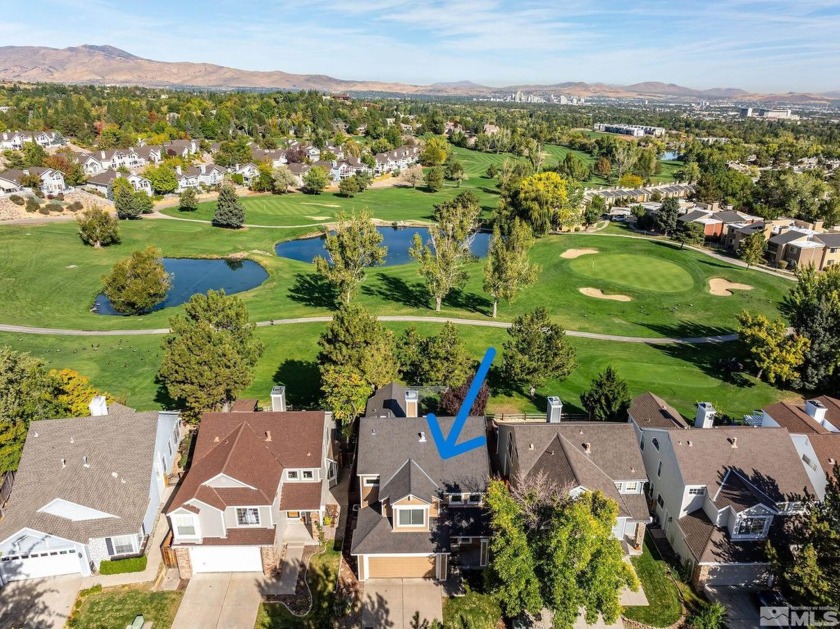 Nestled in a picturesque setting overlooking Lakeridge Golf - Beach Home for sale in Reno, Nevada on Beachhouse.com