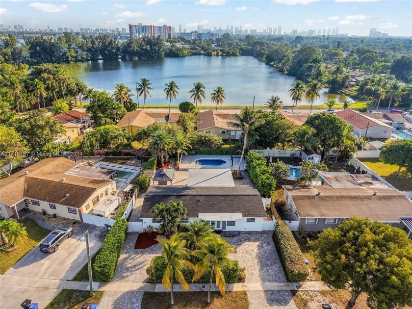 Located in a quiet, desirable neighborhood, this 5-bedroom home - Beach Home for sale in North Miami Beach, Florida on Beachhouse.com