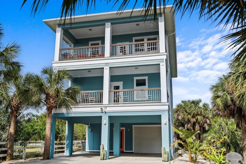 Coastal living at its finest! This custom-built, three-story - Beach Home for sale in Flagler Beach, Florida on Beachhouse.com