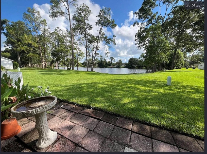 Fully Renovated Waterfront 2BR/2BA in Kings Colony - Lake Views - Beach Townhome/Townhouse for sale in Palm Coast, Florida on Beachhouse.com