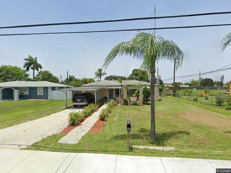 2 bedroom home situated on expansive 1/4 acre with no HOA! Step - Beach Home for sale in Palm Springs, Florida on Beachhouse.com